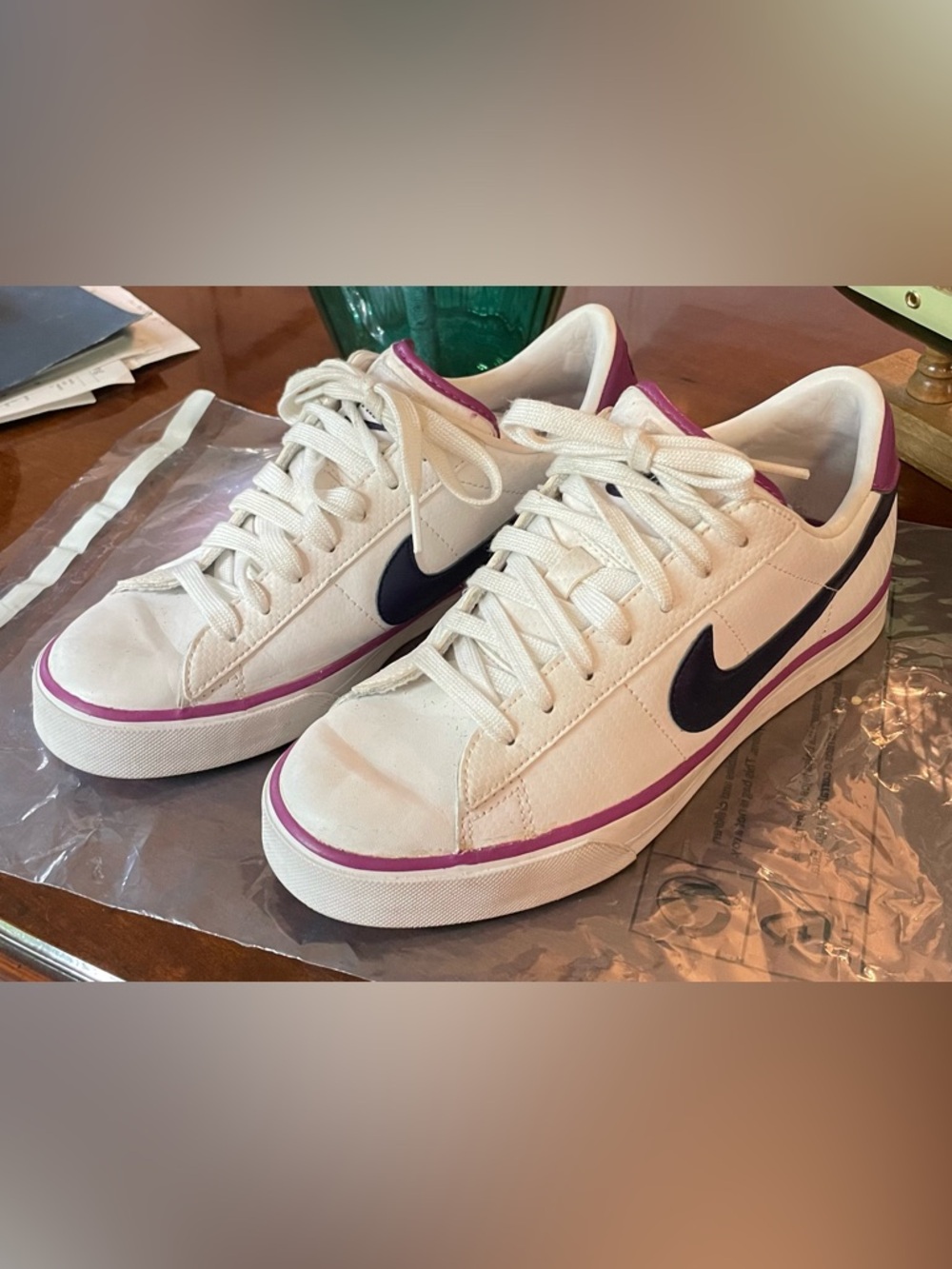 Nike Women’s White Low-Top Sneakers with Purple Trim and Navy Blue Swoosh